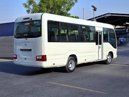 
										TOYOTA COASTER PETROL 2.7 MT – AUTO DOOR – 23 SEATER – 2 POINT BELT – 2025 MODEL – WHITE  full									