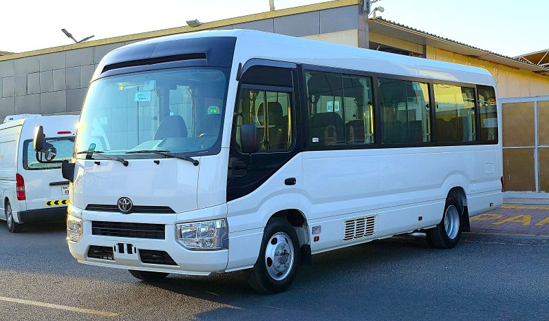 
								TOYOTA COASTER PETROL 2.7 MT – AUTO DOOR – 23 SEATER – 2 POINT BELT – 2025 MODEL – WHITE  full									