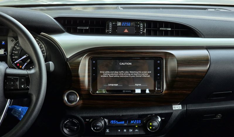 
								TOYOTA HILUX PETROL 2.7 DOUBLE CABIN – AT – HIGH OPTIONS – PUSH START – 2025 – BLACK INSIDE BLACK – YEMEN SPECS full									