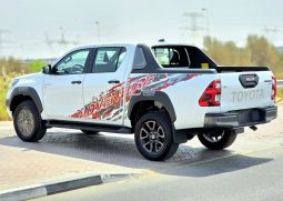 
										HILUX ADVENTURE PETROL 4.0L – FULL WITH COMPRESSOR – WHITE INSIDE BLACK – OMANI full									