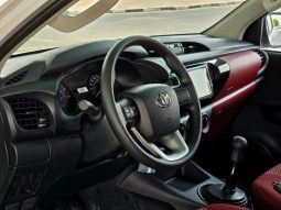 
										TOYOTA HILUX DIESEL 2.4 NARROW – M/T – BASIC – POWER WINDOWS – 2025 MODEL – WHITE INSIDE RED – OMANI full									
