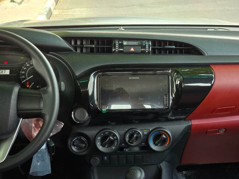 TOYOTA HILUX DIESEL 2.4 NARROW – M/T – BASIC – POWER WINDOWS – 2025 MODEL – WHITE INSIDE RED – OMANI