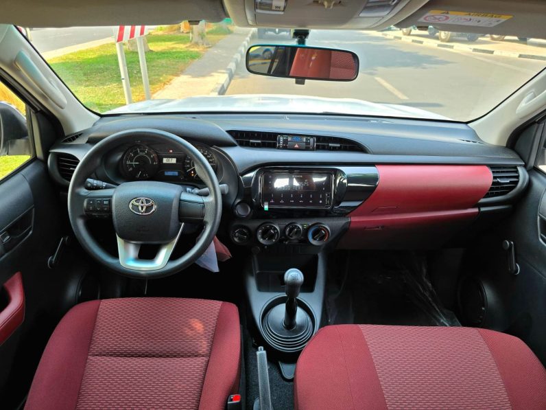 TOYOTA HILUX DIESEL 2.4 NARROW – M/T – BASIC – MANUAL WINDOWS – 2025 MODEL – WHITE INSIDE RED – OMANI
